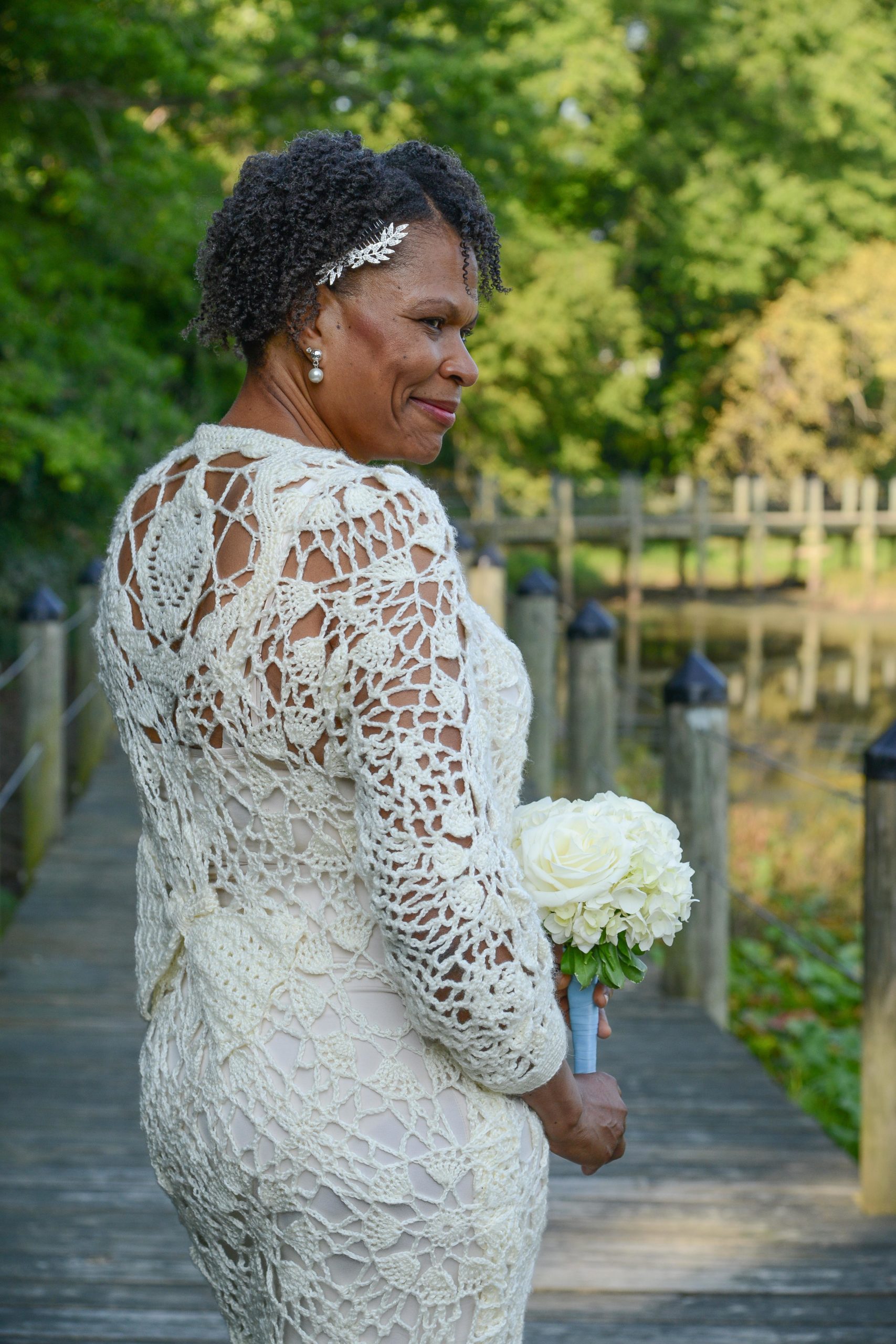 woman wearing crochet wedding dress