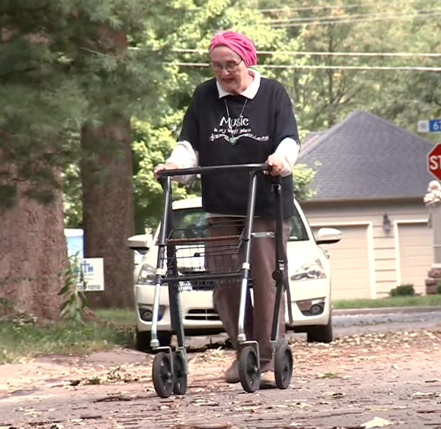 grandma using walker on street