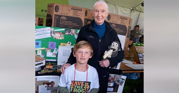 little boy with dr. jane goodall