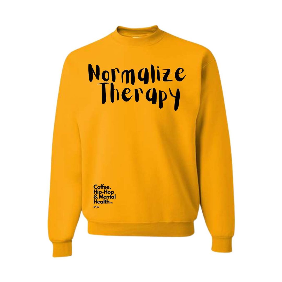 yellow sweatshirt that reads normalize therapy in black letters