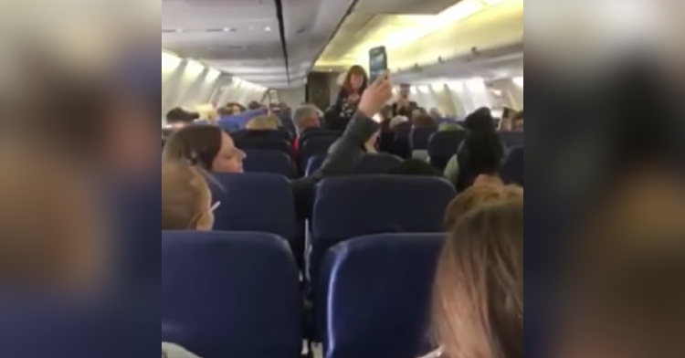 HS choir sings Hallelujah on airplane