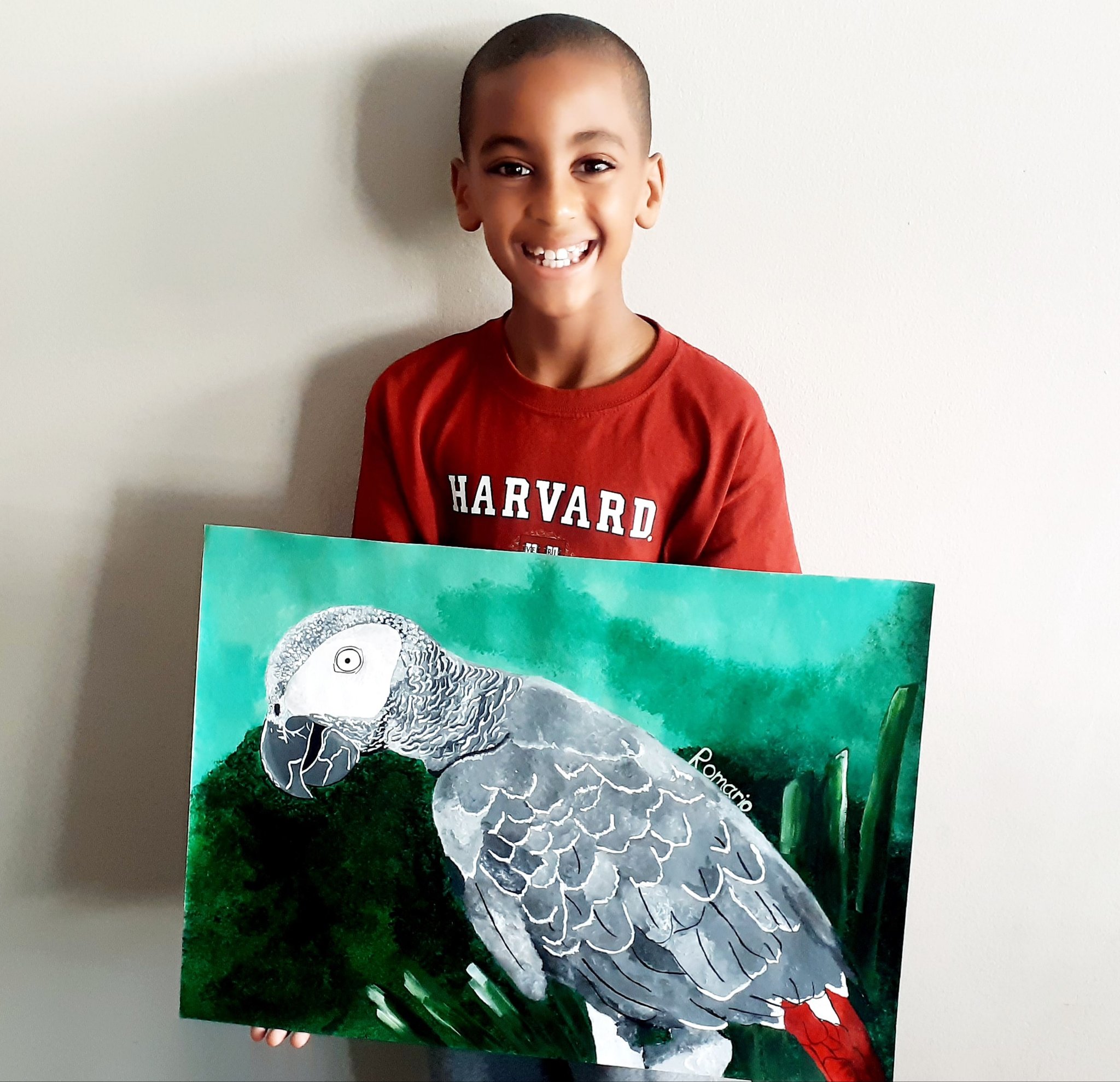 Romario Valentine and his parrot painting