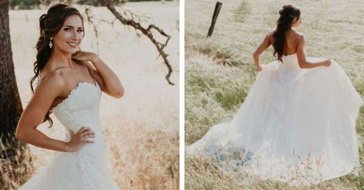 woman standing in wedding dress in field