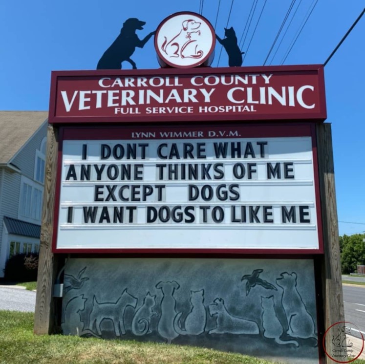 carrol county veterinary clinic sign that reads "I don't care what anyone thinks of me except dogs I want dogs to like me"