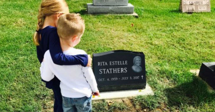 brother and sister by grandma's headstone