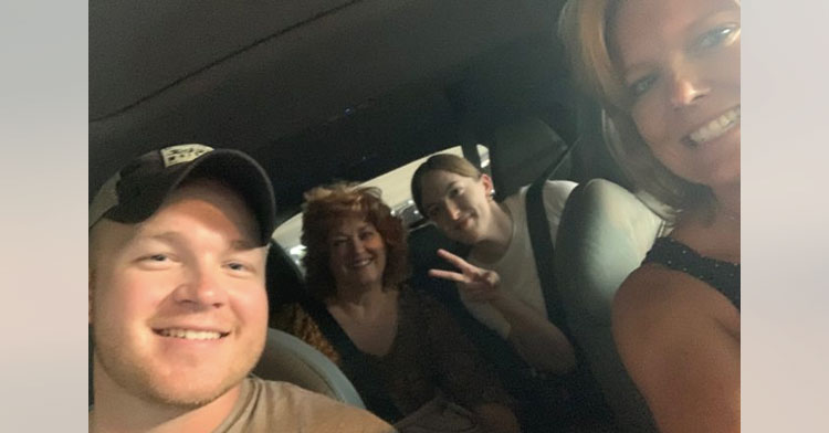 soldier in car with three strangers