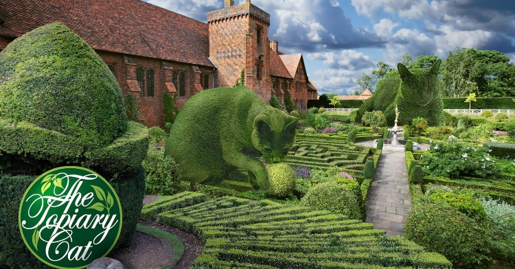the topiary cat image with edited cats in the shape of topiaries in a garden with a house next to them