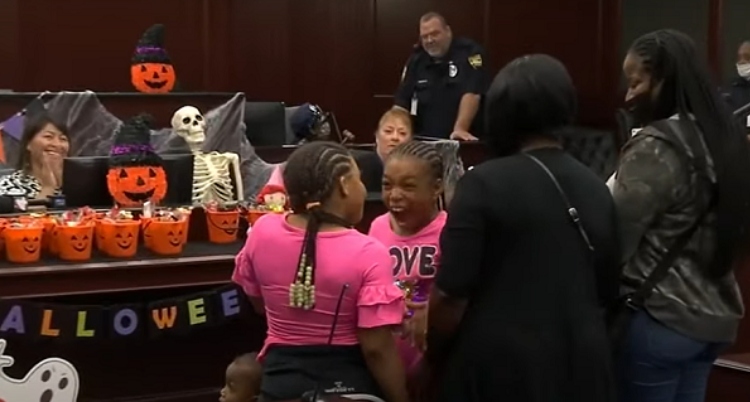 2 little girls excited to be adopted
