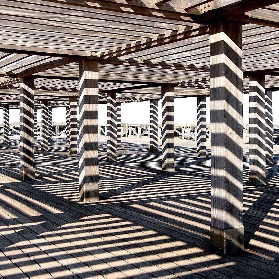 reflection on docks that looks like stripes