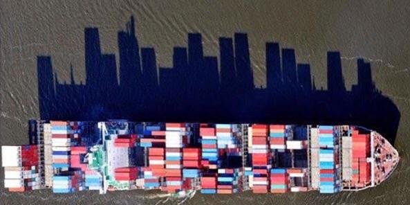 container ship casts a shadow that looks like city skyline