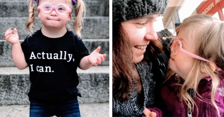 little girl wearing shirt that says "actually, I can" next to mom smiling at daughter with down syndrome