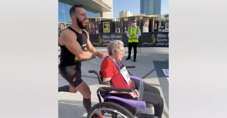 Eric Roldan and mom in middle of marathon