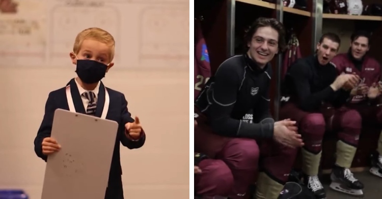 6 year old boy named callan perks wearing a face mask and holding a clip board while giving a pre-game speech to the peterborough petes and the hockey players of the team smiling and clapping in response