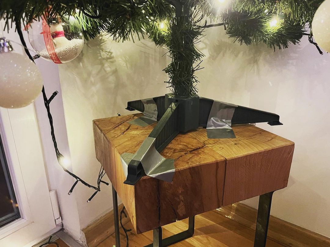 duct taped Christmas tree stand