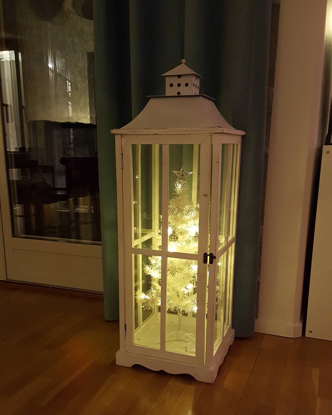 Christmas tree inside a lantern