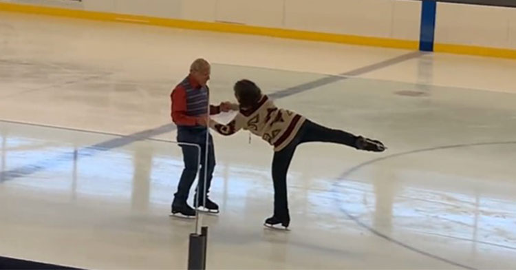 77-year-old dancing with instructor on ice