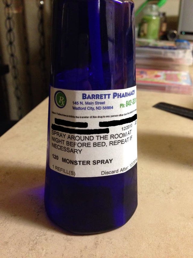 dark blue spray bottle labeled as "monster spray" from barrett pharmacy 