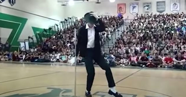 teen dancing to michael jackson in front of high school audience