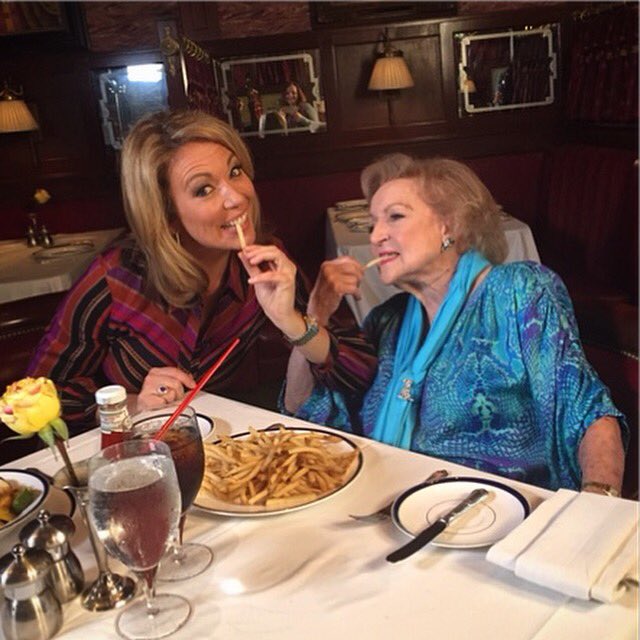 Betty White eating French Fries with Brooke Baldwin