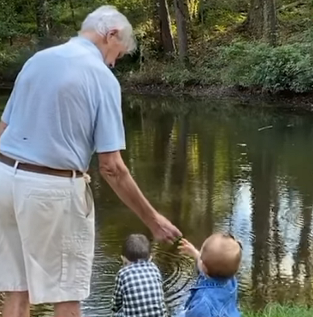 pawpaw and grandkids by pond