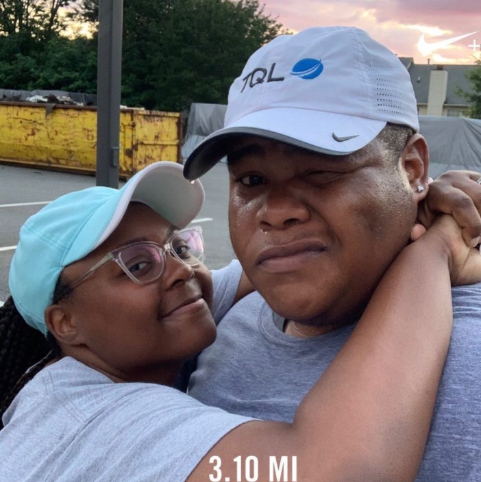 a woman named camille jones and a man named marlon jones posing for a selfie after running and the miles they've run are in text the bottom at 3.10 mi