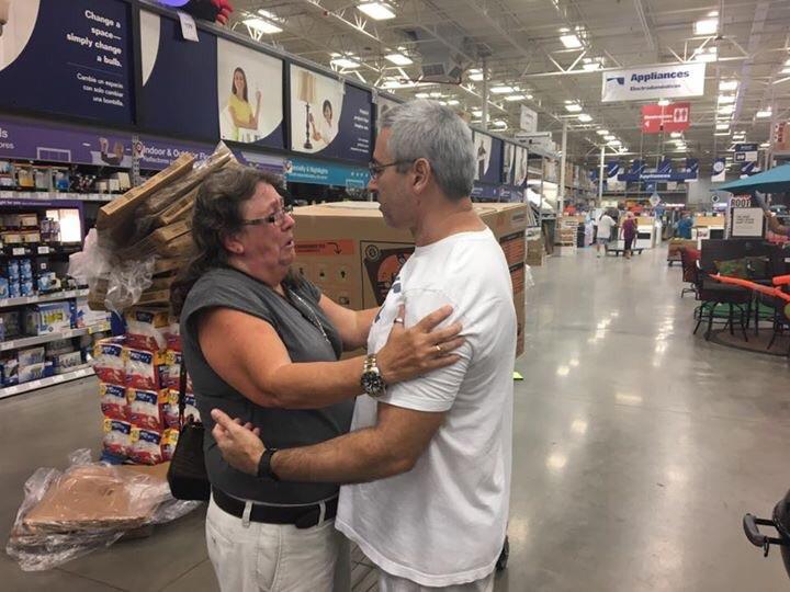 two strangers hugging in Lowes