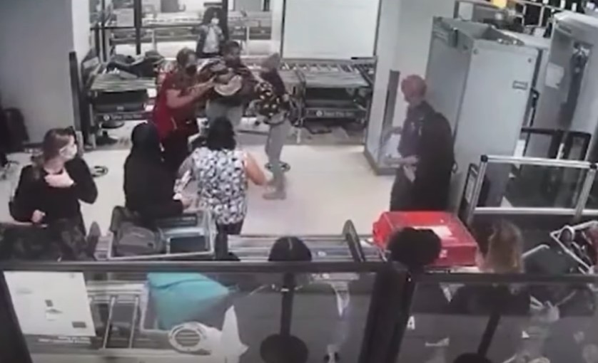 tsa footage from newark liberty international airport where a woman is calling out for help for her choking 2 month old