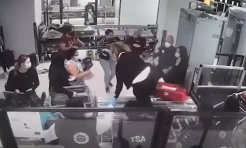 tsa footage from newark liberty international airport where a tsa agent named cecilia morales is climbing over a checkpoint conveyor belt roller to get to a mom whose 2 month old baby is choking