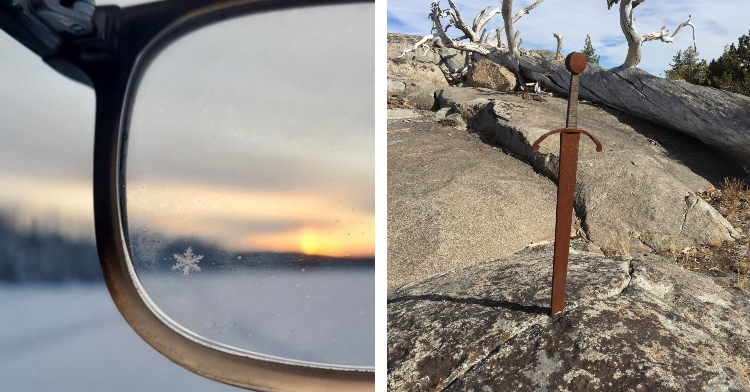 closeup on a glasses lens that has a singular visible snowflake on it and a random sword stuck in a crack in the rocky ground