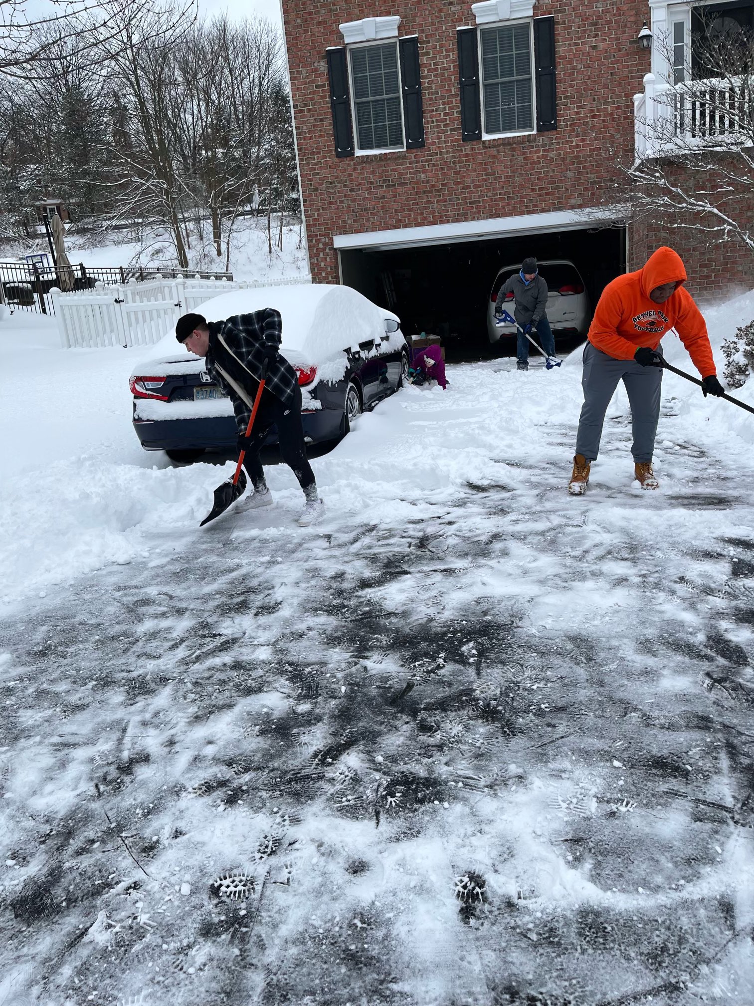 teams shoveling snow