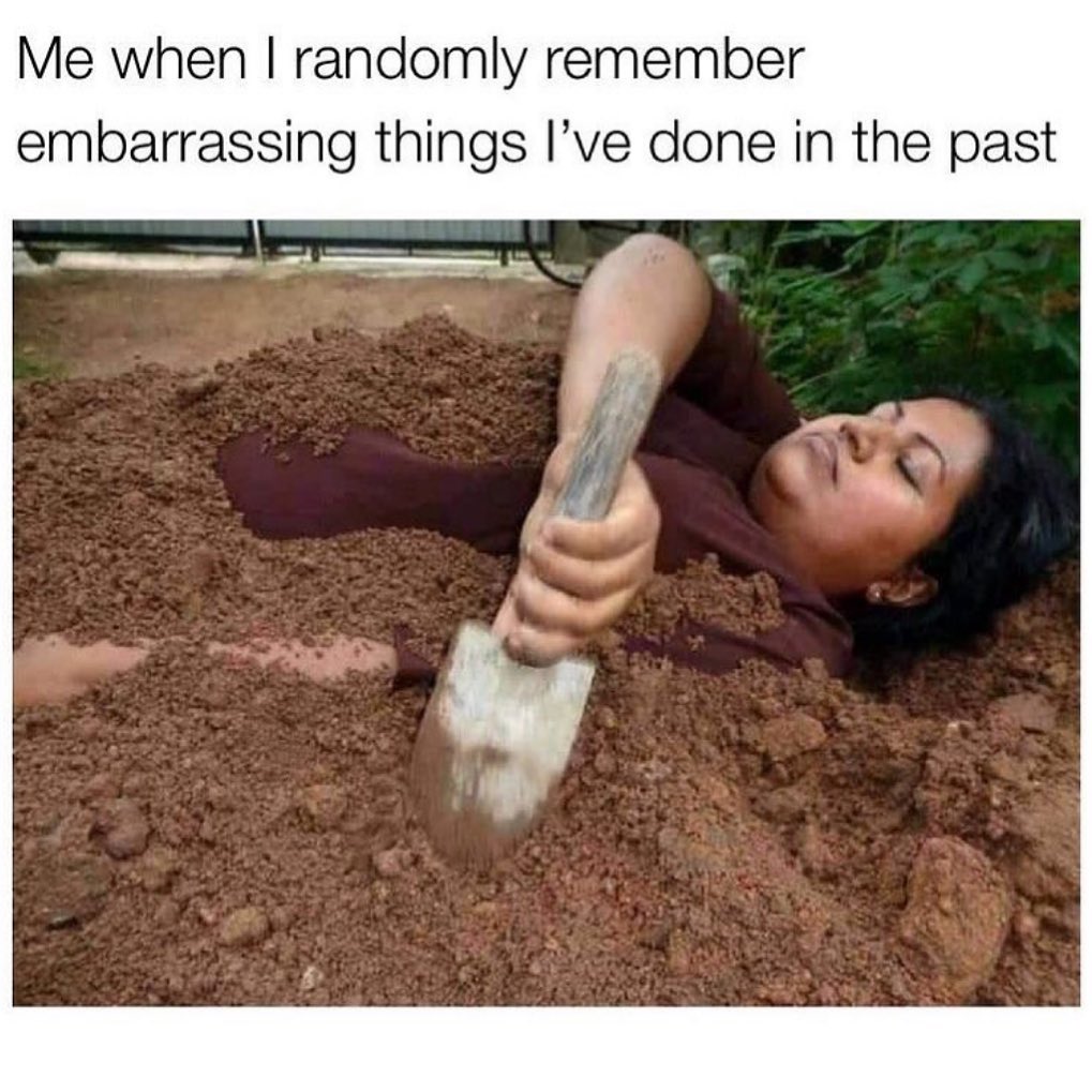 person burying themself in dirt