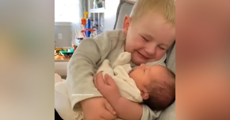 Cuteness Alert! Little Boy Gets Choked Up Holding Baby Sister For 1st Time.  – InspireMore