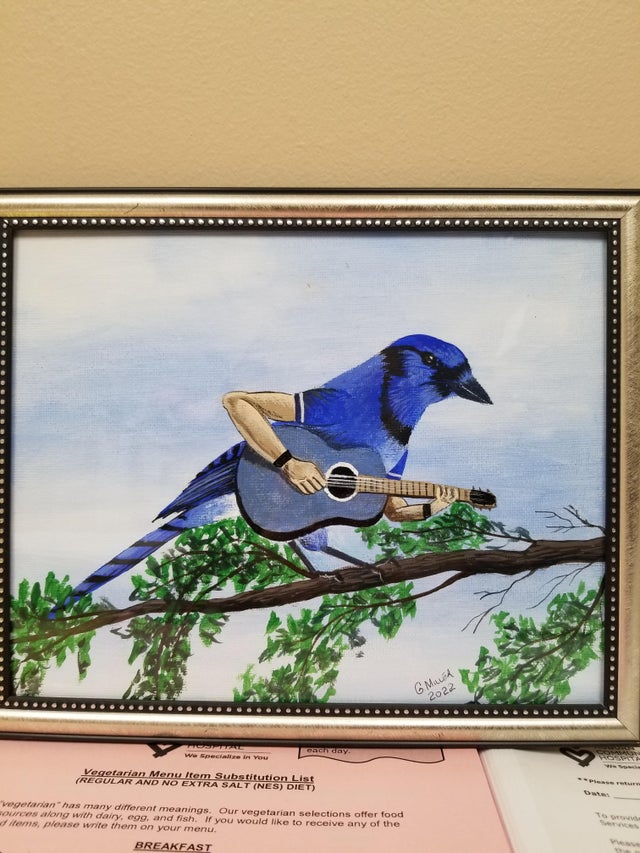 a drawing of a bluebird with human arms who is playing a guitar