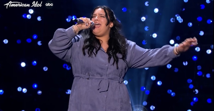 “american idol” contestant nicolina bozzo closing her eyes and extending one arm and passionately sings “everything I wanted” by billie eilish