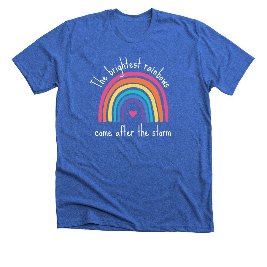 a t-shirt from bonfire by team adam that is blue and reads "the brightest rainbows come after the storm"