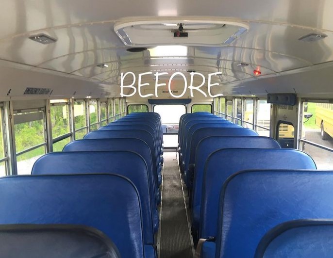 interior view of a an american school bus before it was renovated by angus luff