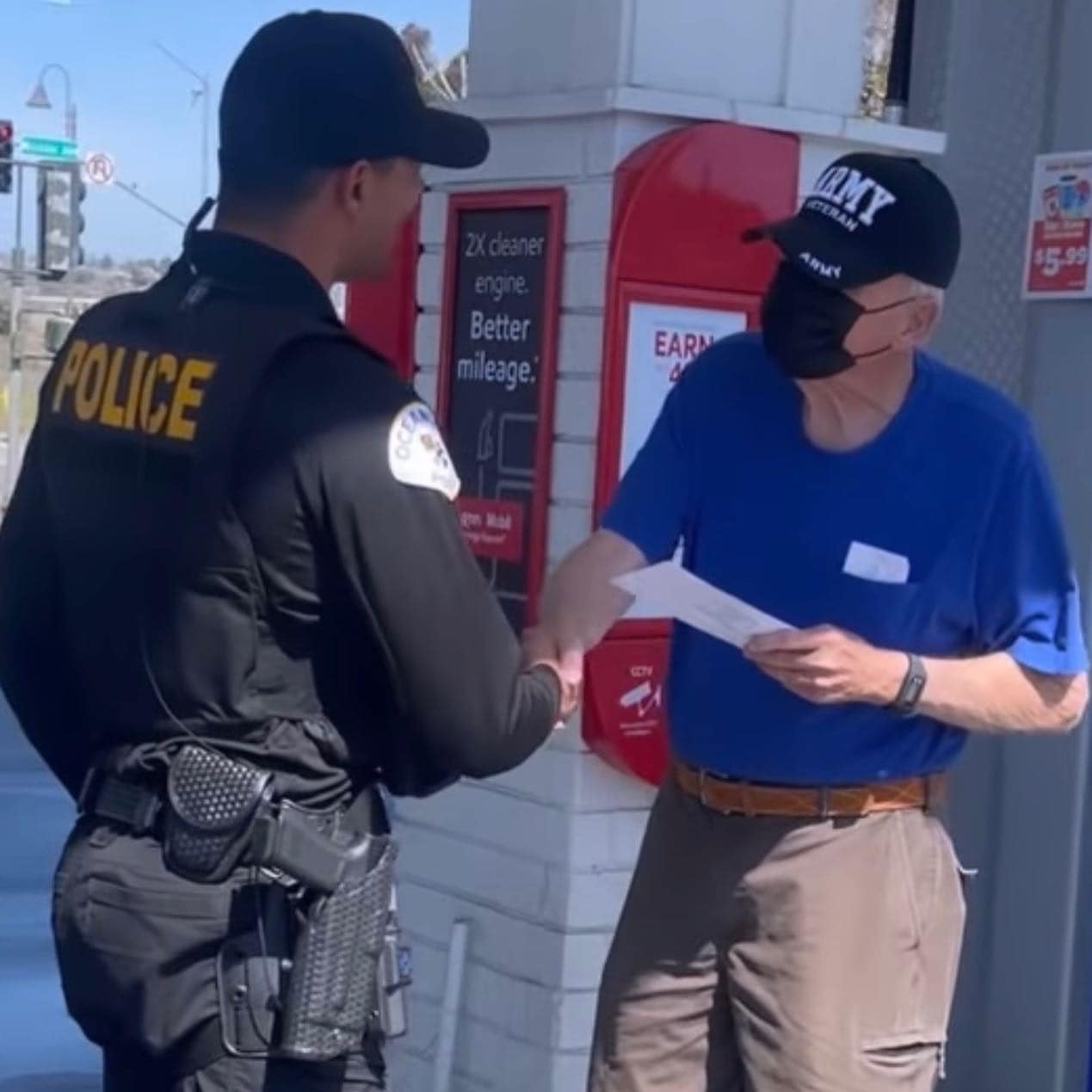 Oceanside police giving money at gas pumps