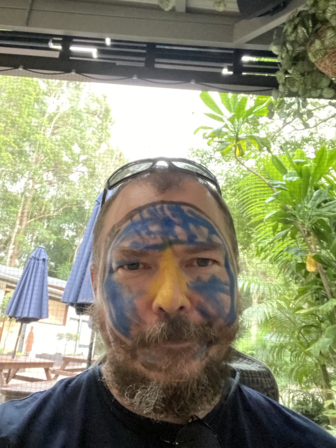 dad with random colors on his face.