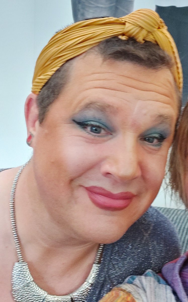 dad wearing makeup and accessories. 