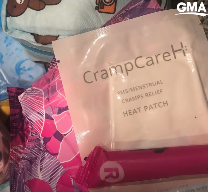 closeup of feminine hygiene products, including one my crampcareh. it's labeled as a 
