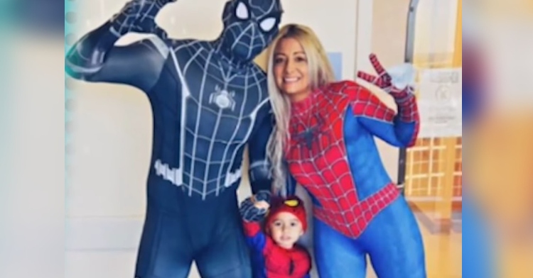 Hernandez family wearing spiderman's costumes