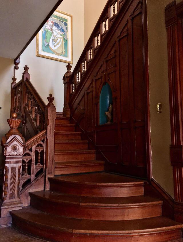 staircase in an 1890 Queen Anne Victorian home in Illinois