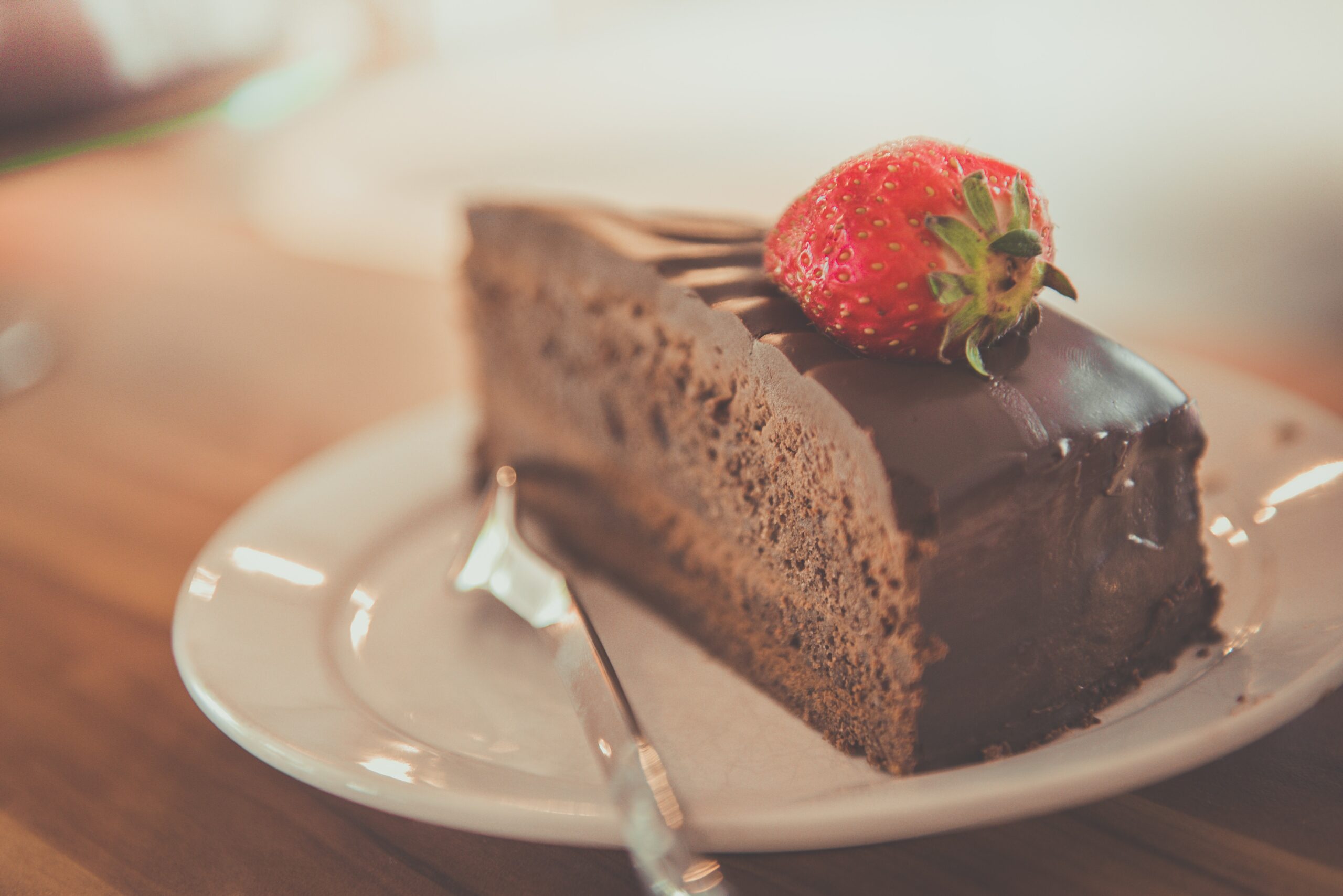 chocolate cake with a strawberry on top