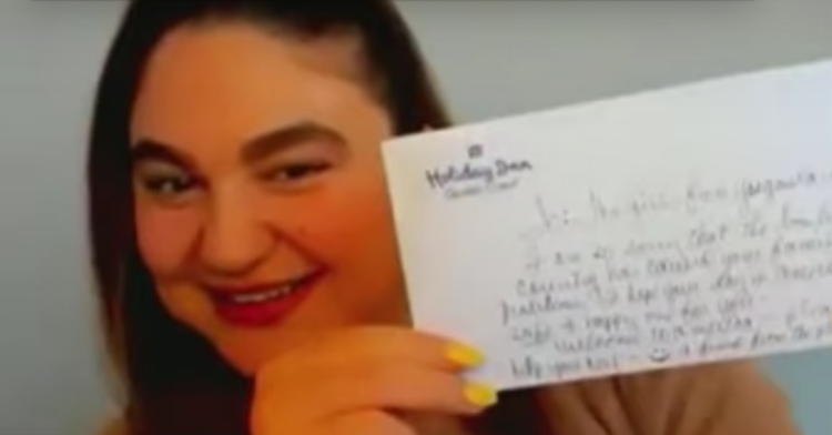 ayda contino holding the note that tracy peck gave her 23 years ago