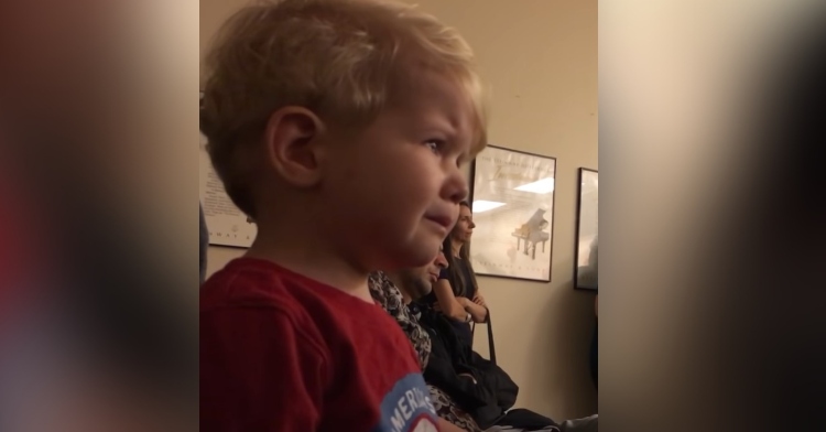 two year old tyler noftz tearing up as he watches his sister perform “moonlight sonata” on the pirano.