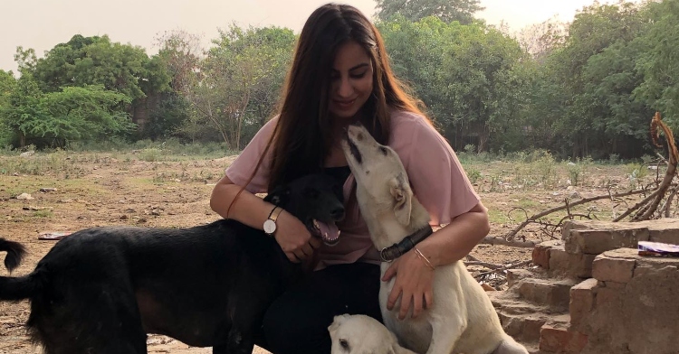 Anoushka Mehta giving love to two dogs