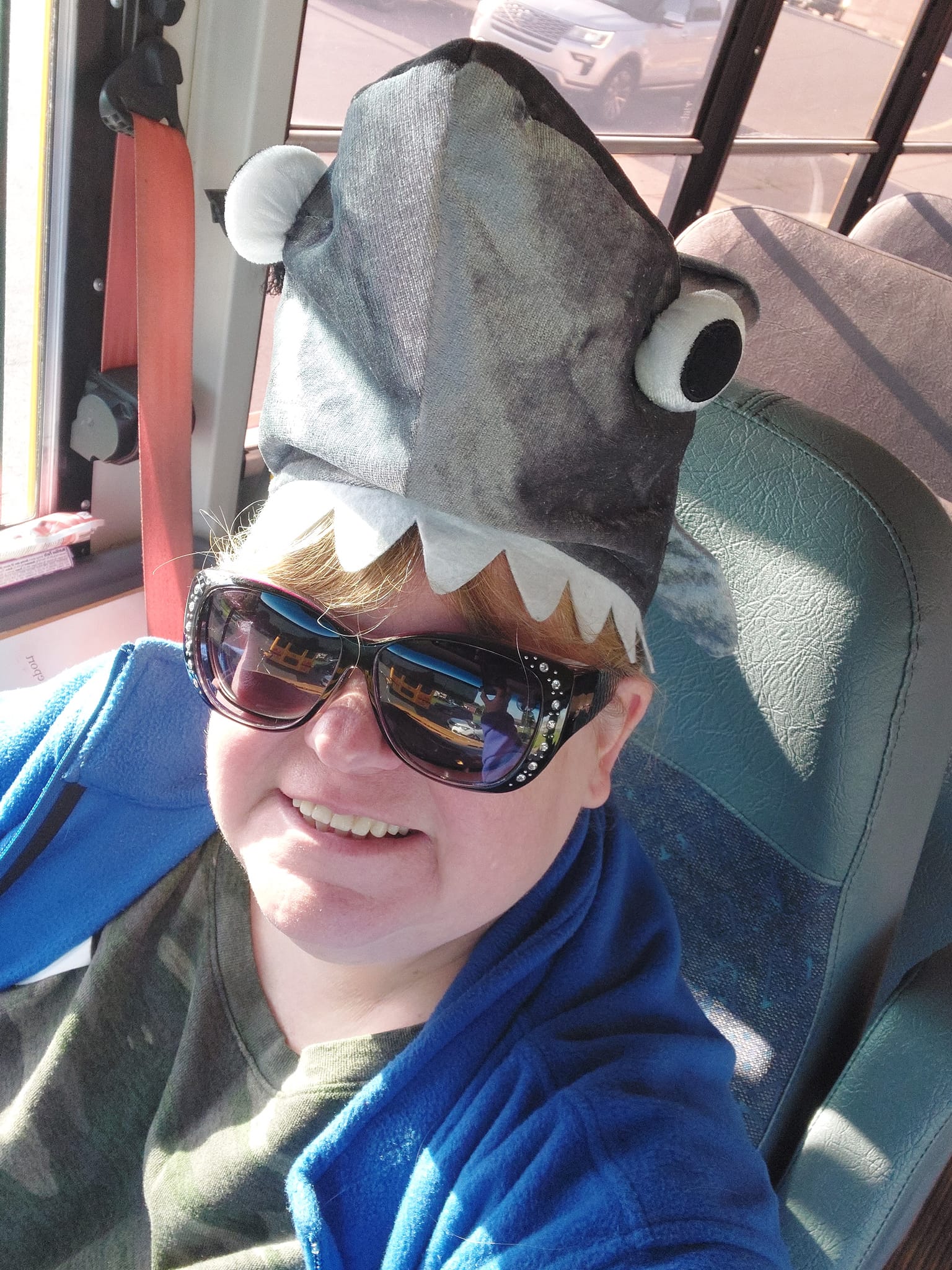 Rose George wearing a shark hat