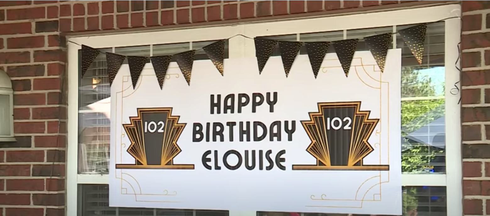 birthday banner that says "happy birthday elouise" with the number 102 