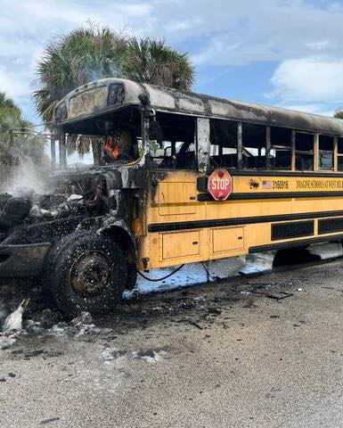 school bus charred remains after the fire