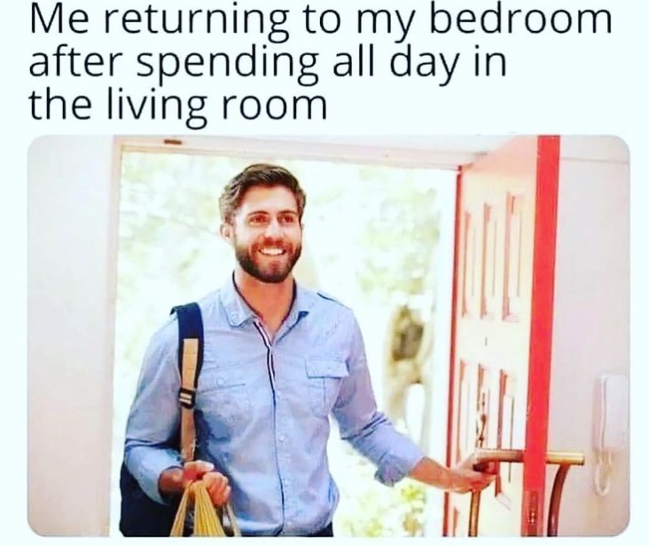 a man smiling as he walks in the door. it's captioned with "me returning to my bedroom after spending all day in the living room."